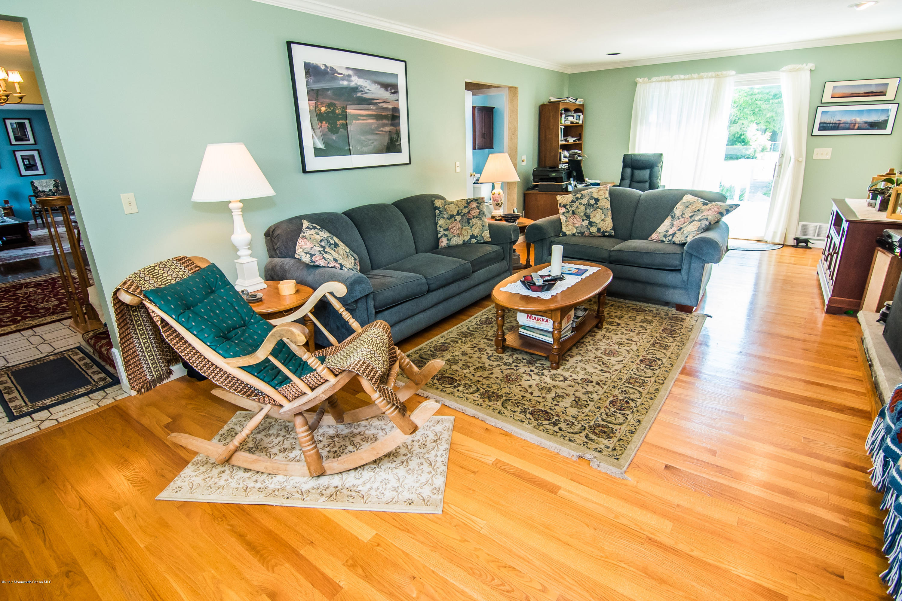 22 Old Post Road Freehold, NJ 07728 - Photo 12 of 61 a living room with furniture and a table