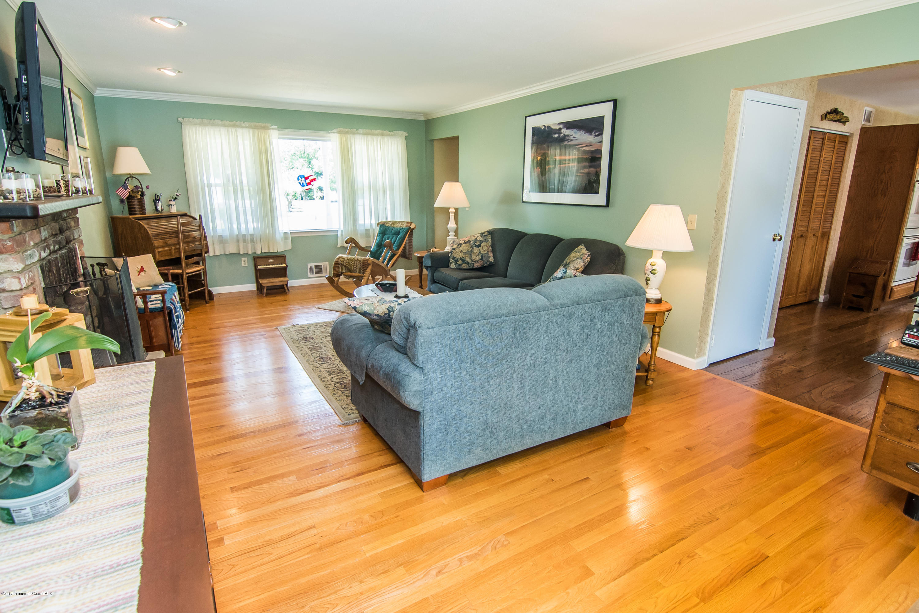 22 Old Post Road Freehold, NJ 07728 - Photo 17 of 61 a living room with furniture and a flat screen tv