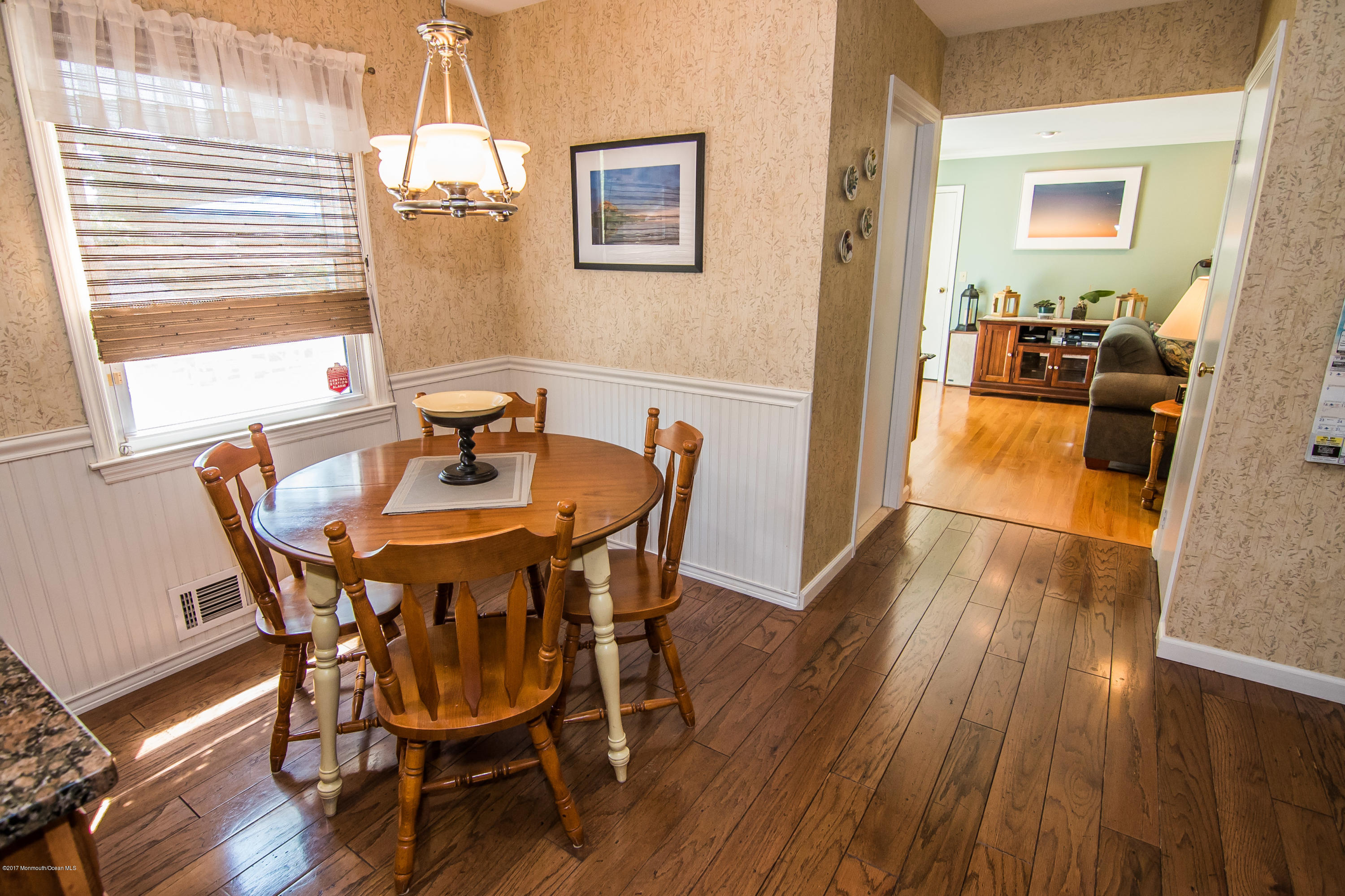 22 Old Post Road Freehold, NJ 07728 - Photo 24 of 61 a view of a dining room with furniture and wooden floor