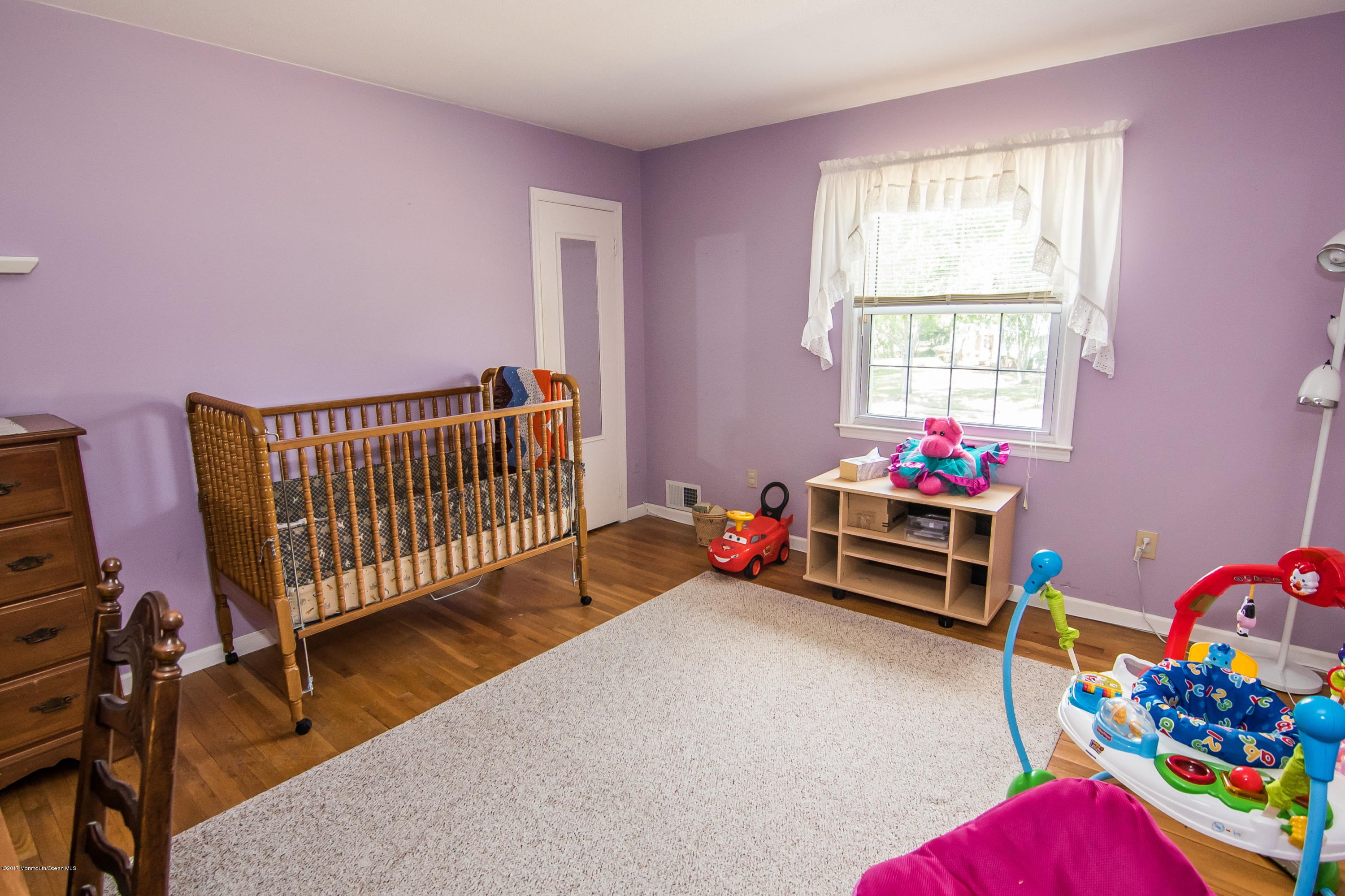22 Old Post Road Freehold, NJ 07728 - Photo 25 of 61 a bedroom with furniture and a window