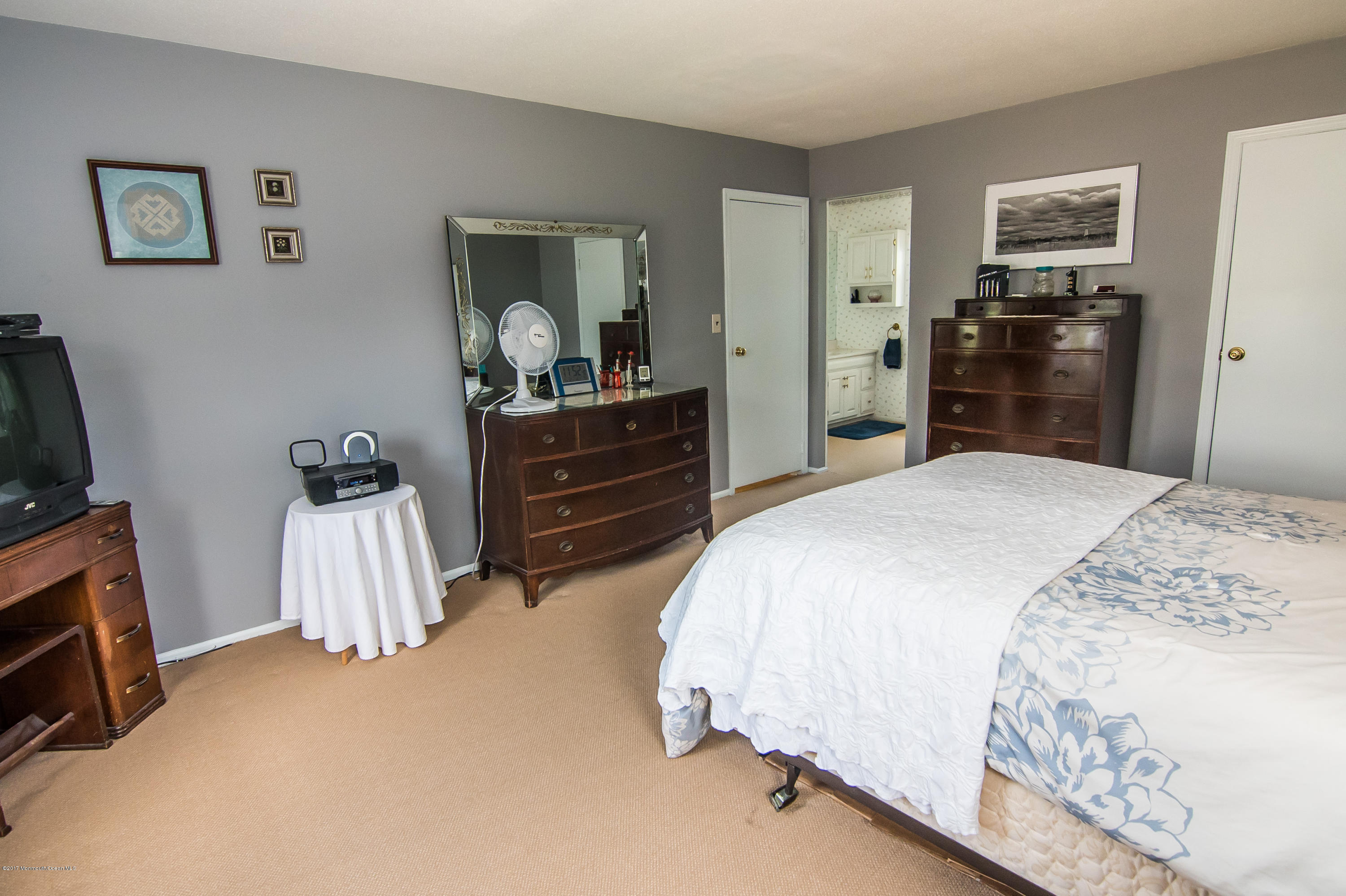 22 Old Post Road Freehold, NJ 07728 - Photo 34 of 61 a bedroom with a bed and a television