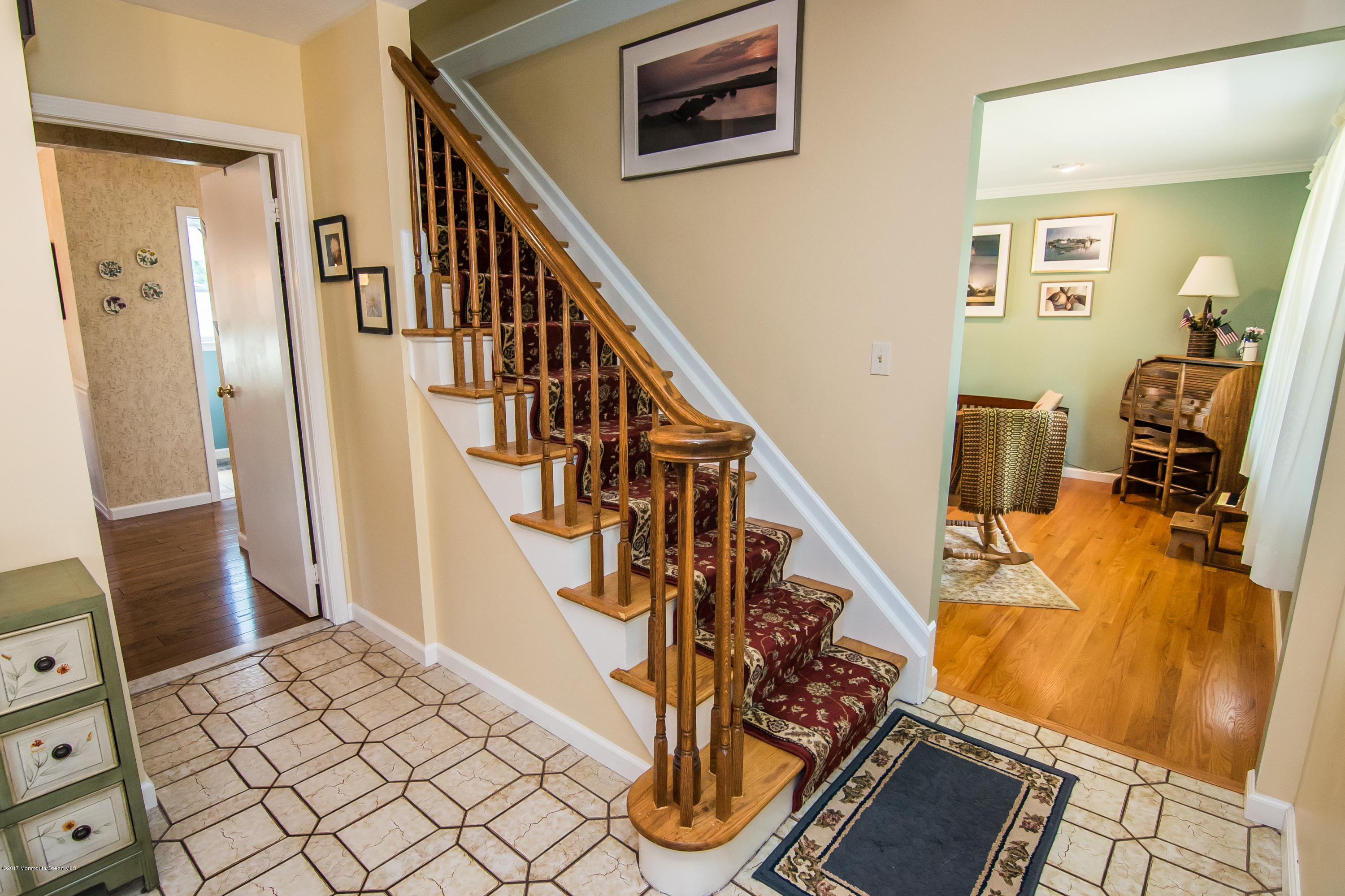 22 Old Post Road Freehold, NJ 07728 - Photo 4 of 61 a view of entryway with wooden floor