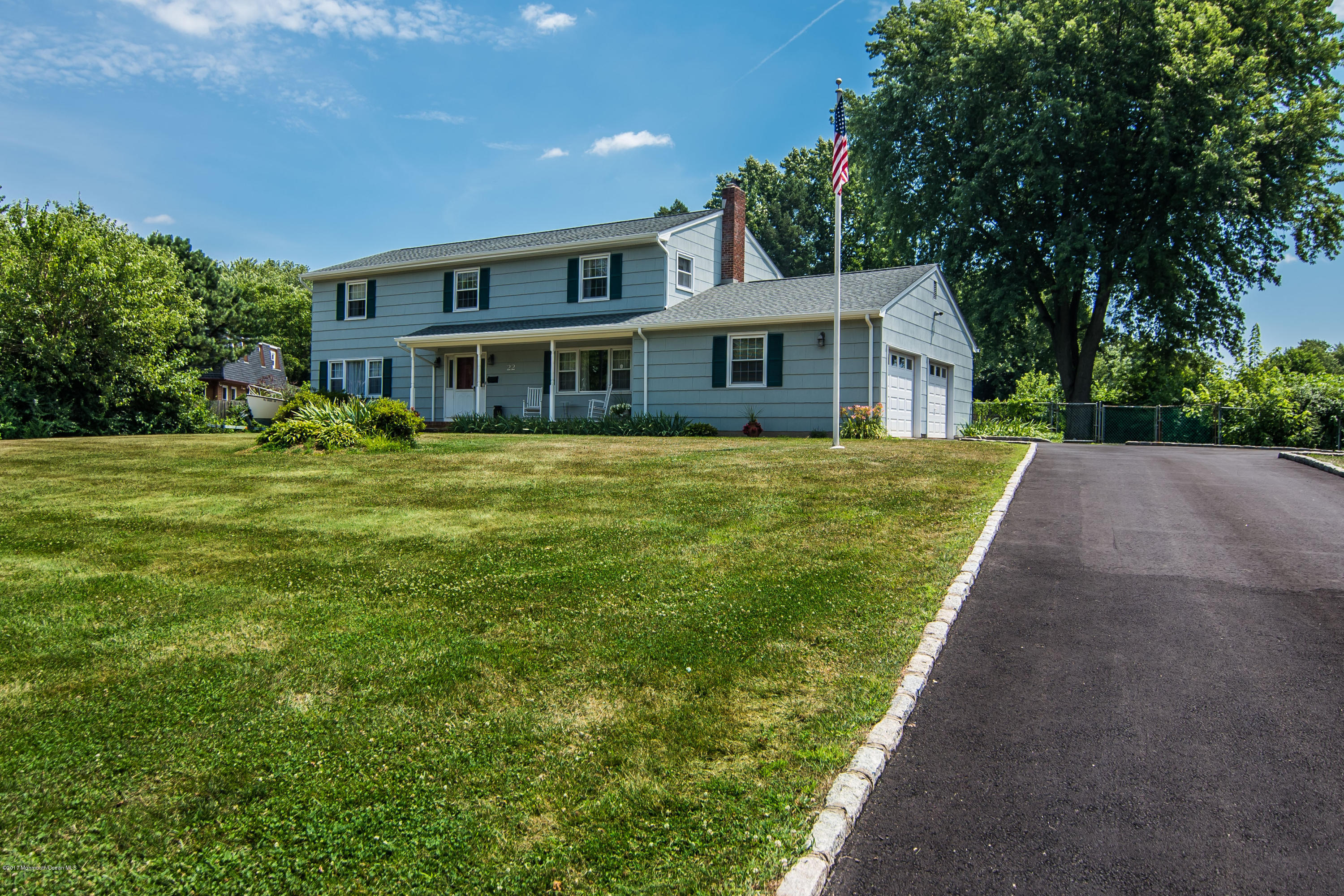 22 Old Post Road Freehold, NJ 07728 - Photo 43 of 61 a front view of a house with a yard