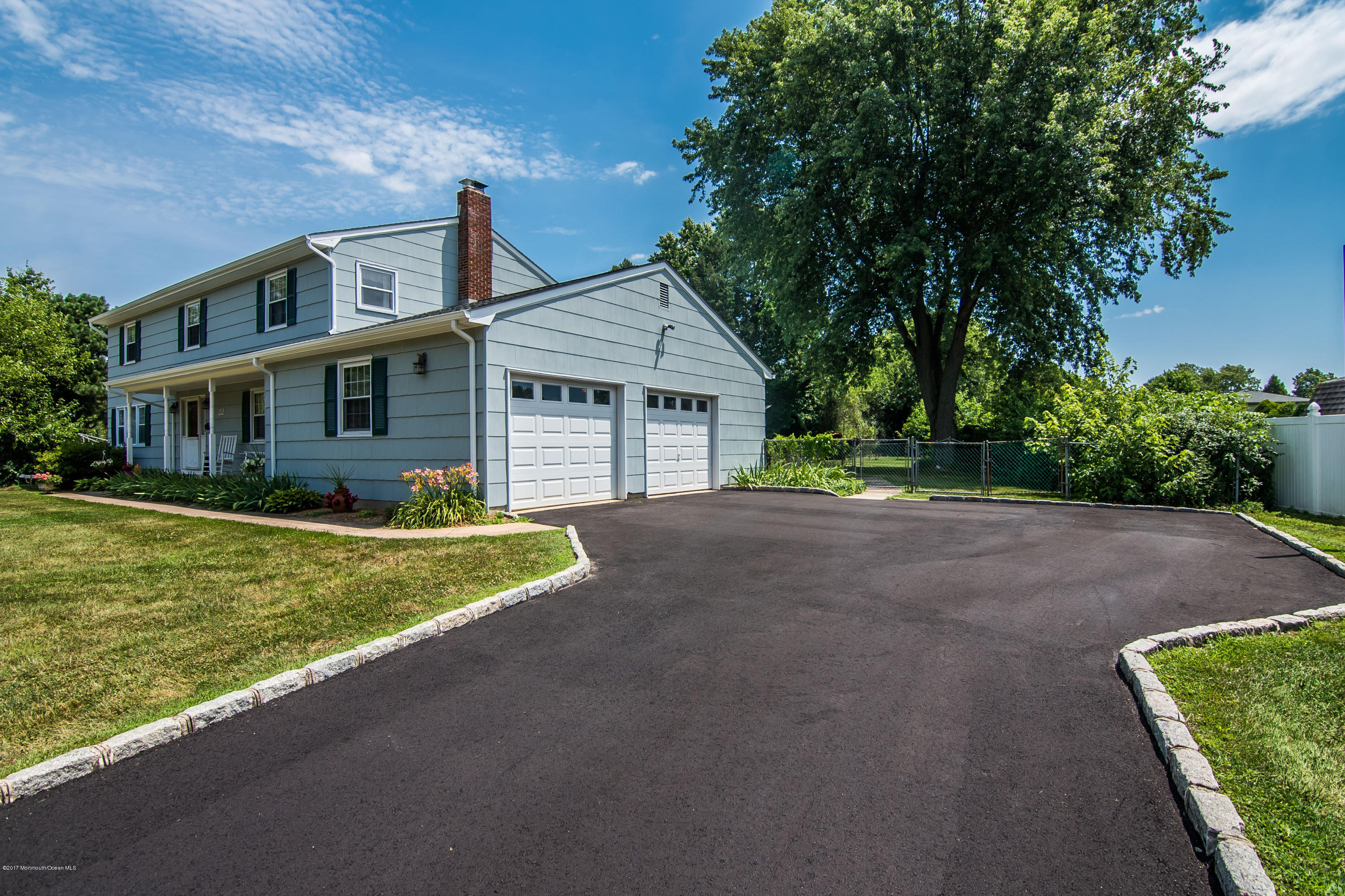 22 Old Post Road Freehold, NJ 07728 - Photo 44 of 61 a view of a house with a yard and plants