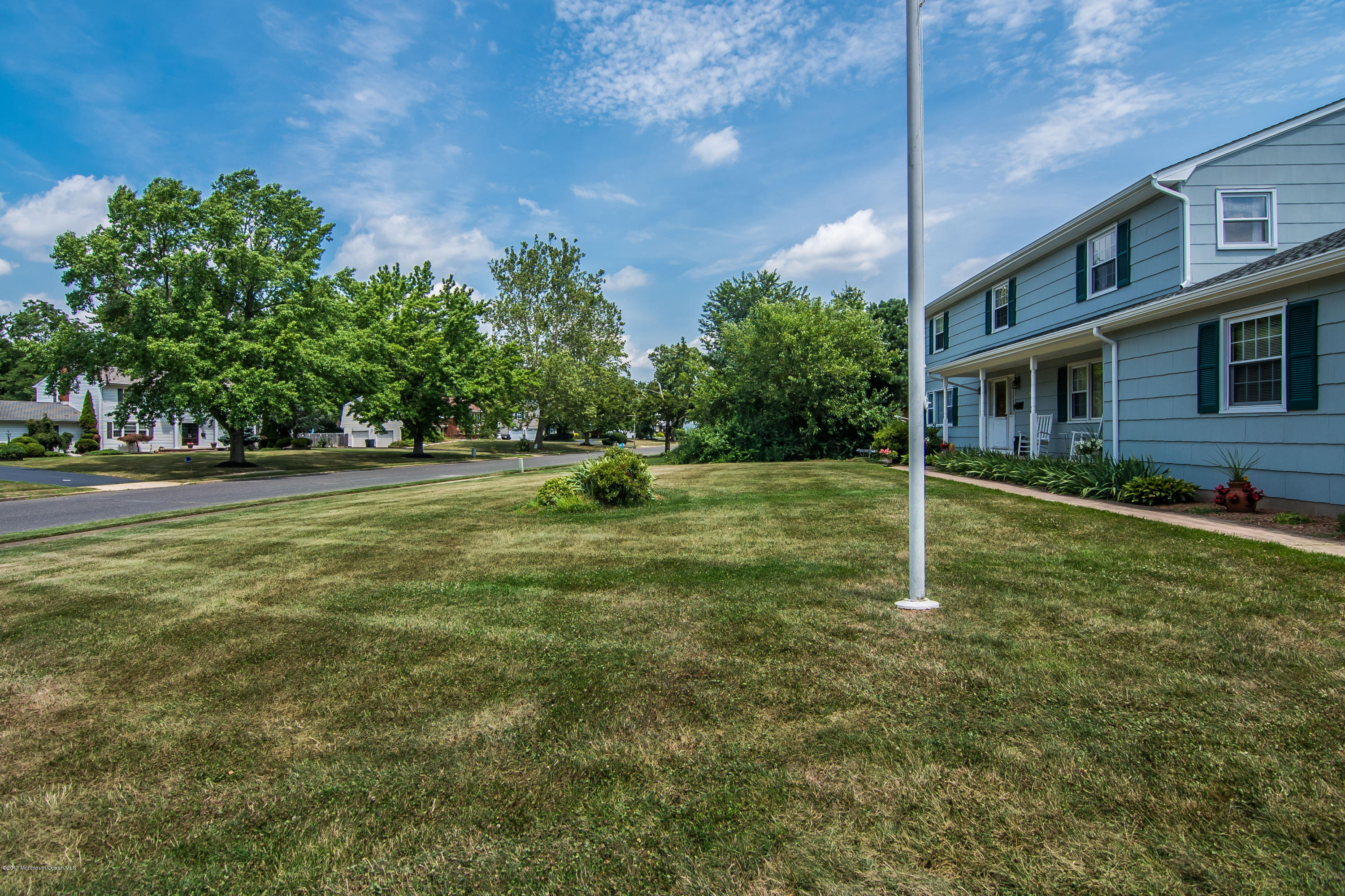 22 Old Post Road Freehold, NJ 07728 - Photo 45 of 61 a view of a house with a backyard