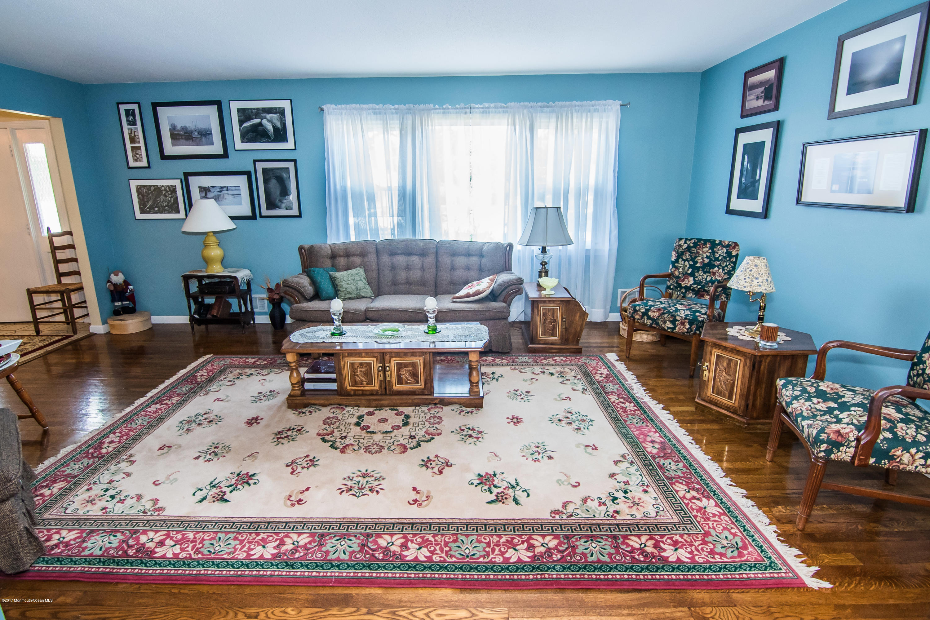 22 Old Post Road Freehold, NJ 07728 - Photo 5 of 61 a living room with furniture and a rug