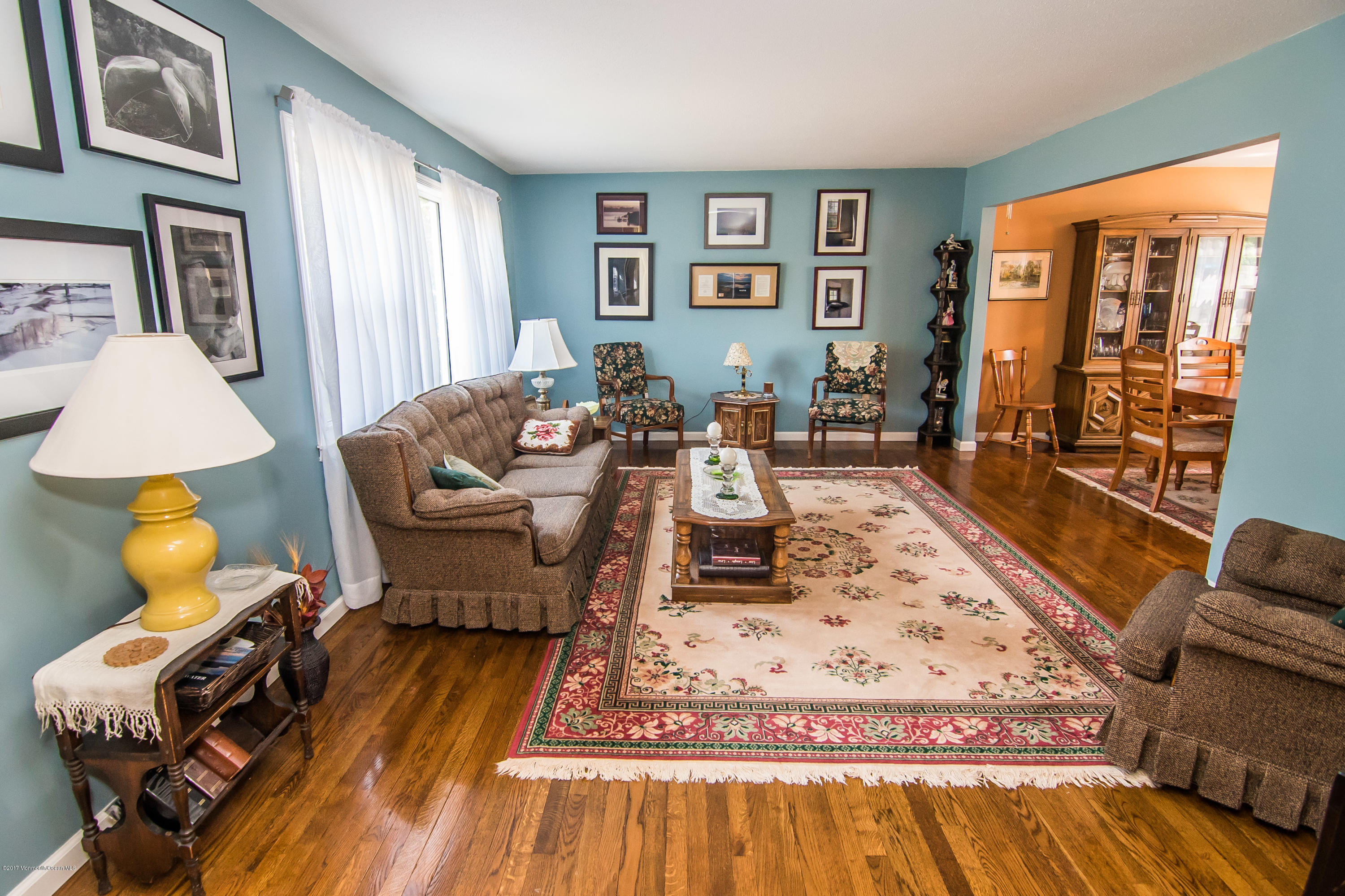 22 Old Post Road Freehold, NJ 07728 - Photo 7 of 61 a living room with furniture rug and window
