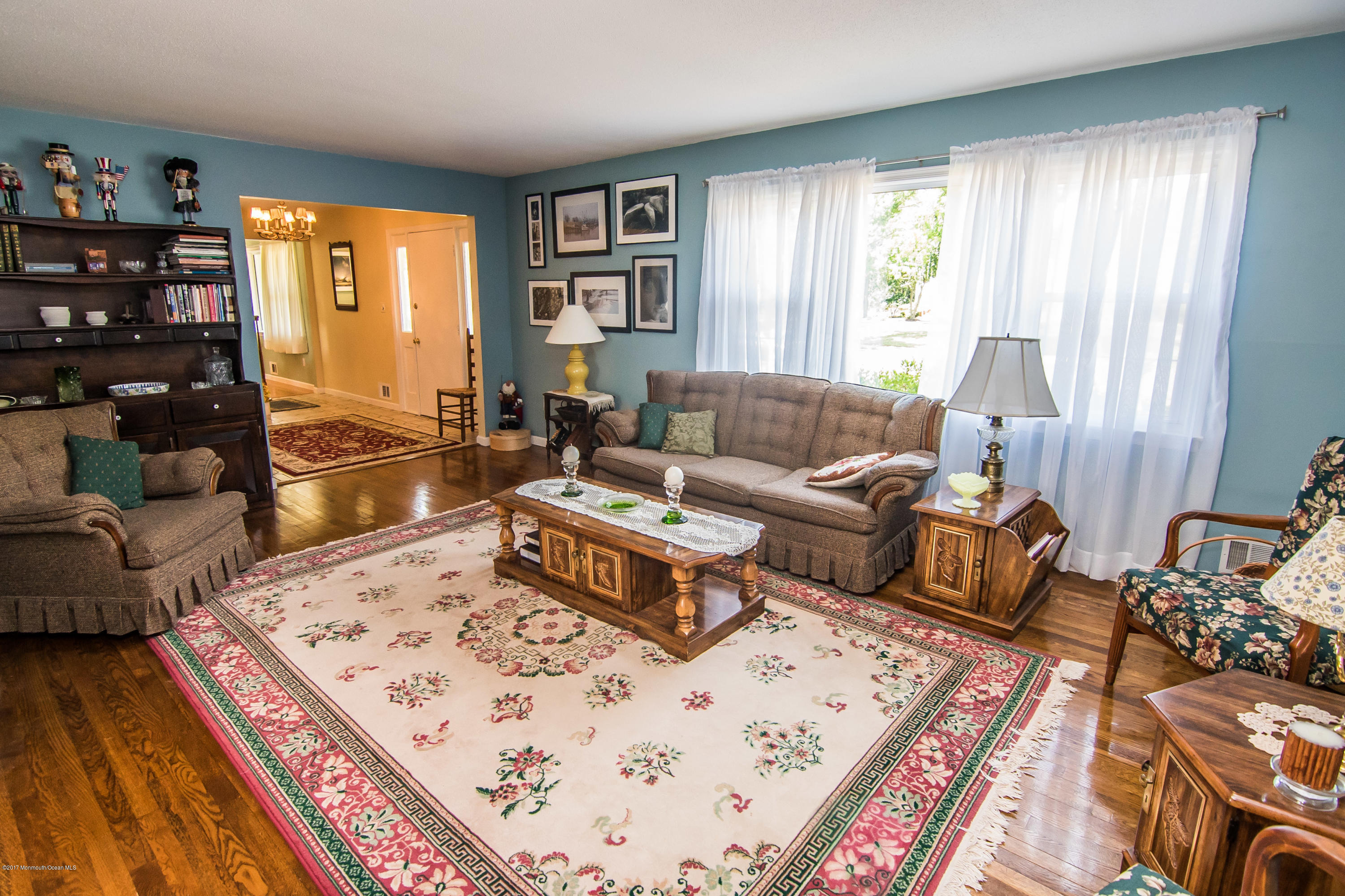 22 Old Post Road Freehold, NJ 07728 - Photo 8 of 61 a living room with furniture and a large window