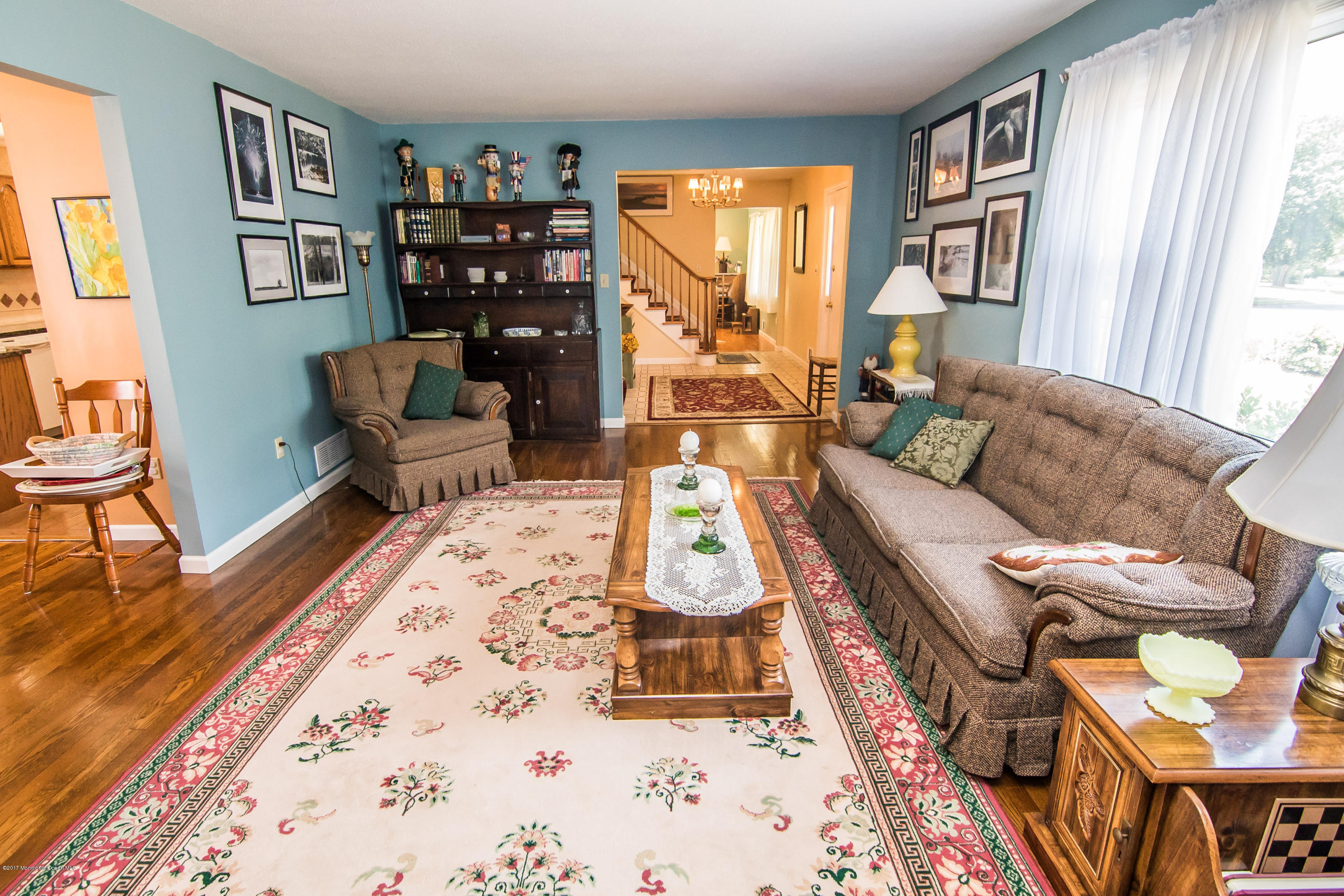 22 Old Post Road Freehold, NJ 07728 - Photo 9 of 61 a living room with furniture and a window