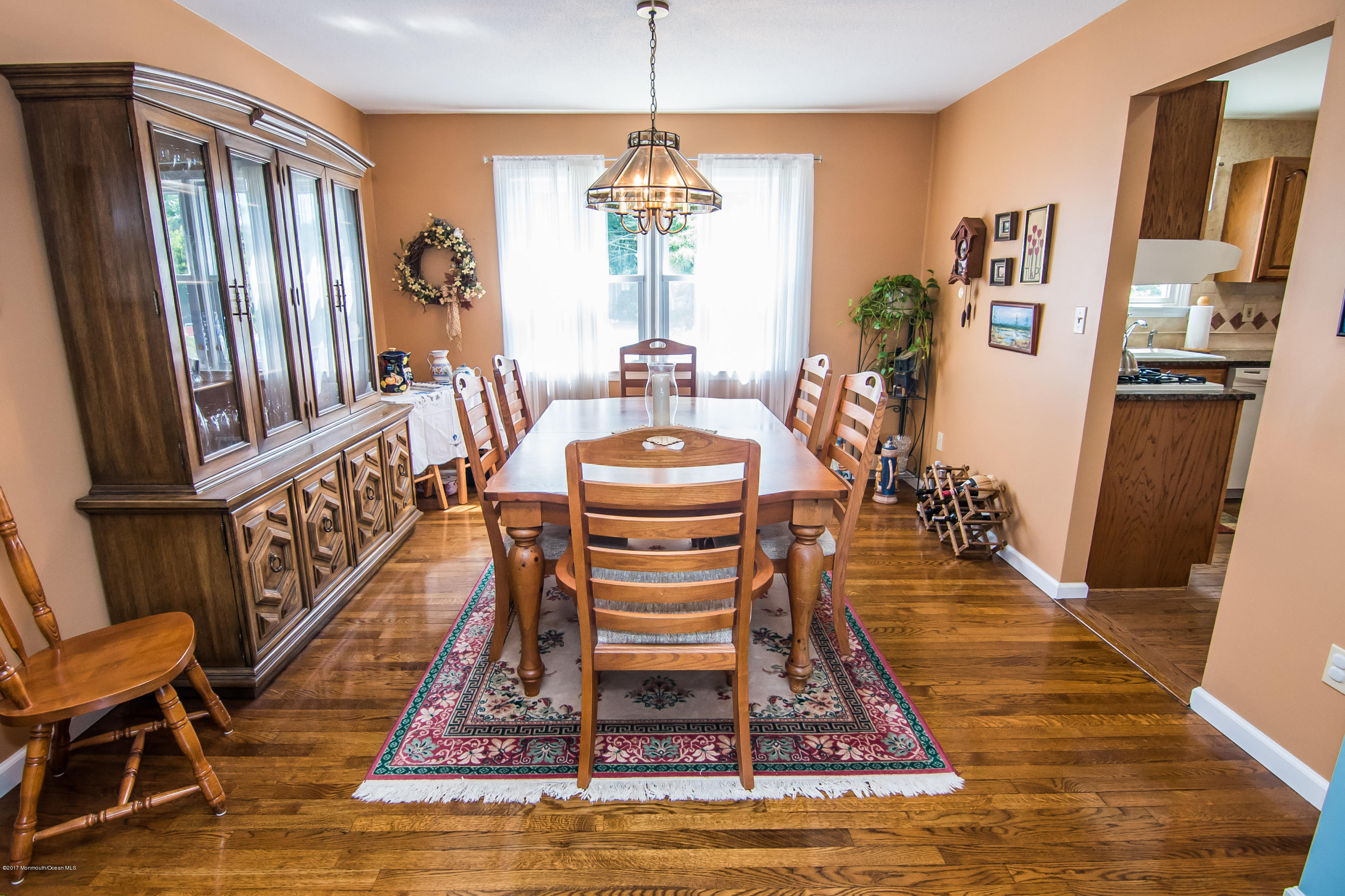 22 Old Post Road Freehold, NJ 07728 - Photo 10 of 61 a room with lots of wooden furniture and a rug