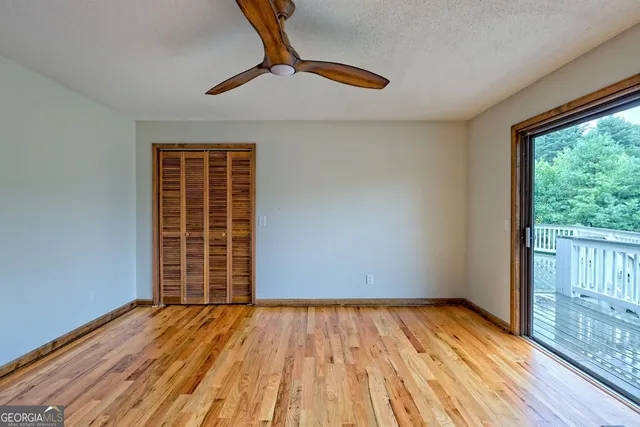 a view of a room that has a large window