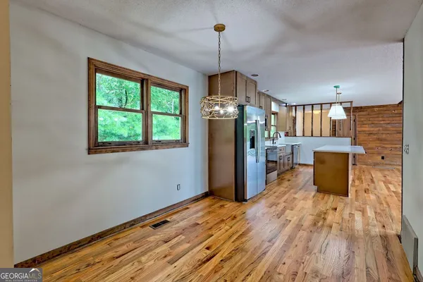 a house with trees in front of it