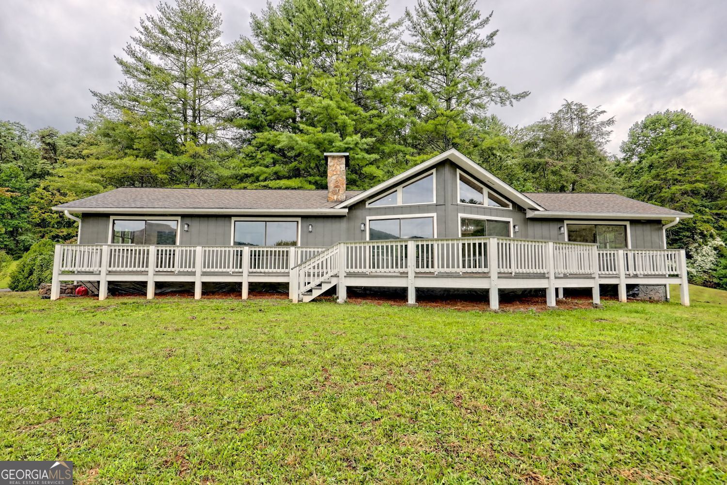 156 Tahoe Lane Dillard, GA 30537 - Photo 64 of 76 a view of a house with yard and sitting area