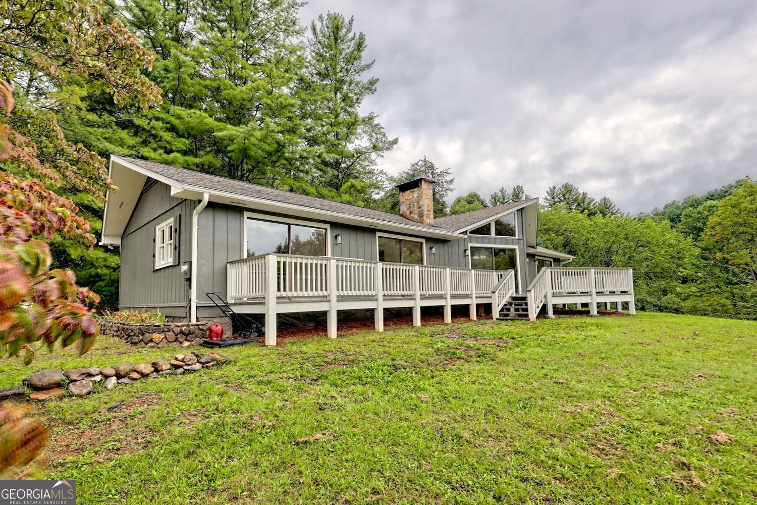 156 Tahoe Lane Dillard, GA 30537 - Photo 65 of 76 a view of a house with a yard