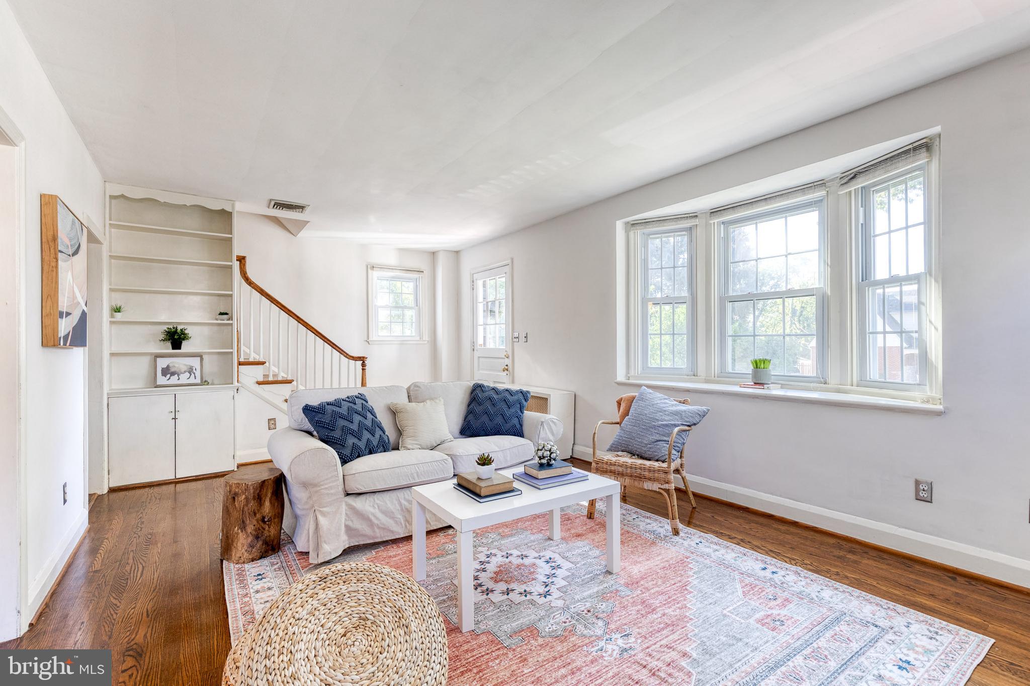724 Murdock Road Baltimore, MD 21212 - Photo 2 of 42 a living room with furniture and wooden floor