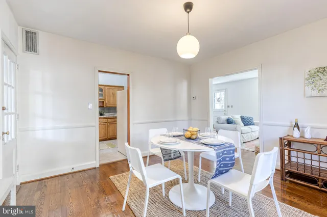 a view of a dining room with furniture