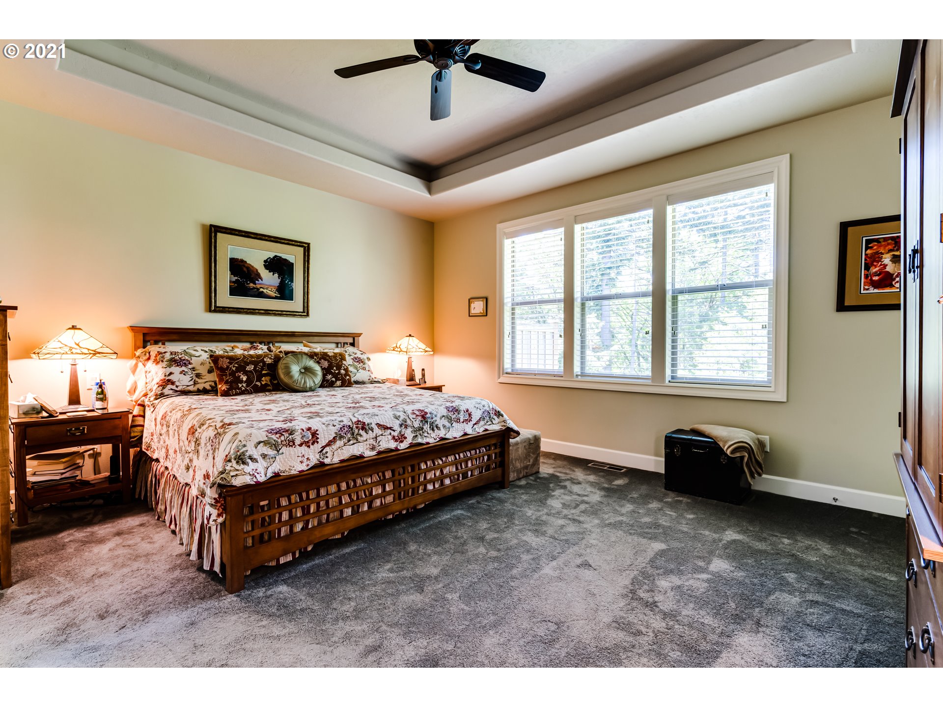 6128 Graystone Loop Springfield, OR 97478 - Photo 11 of 32 a bedroom with a bed and a window