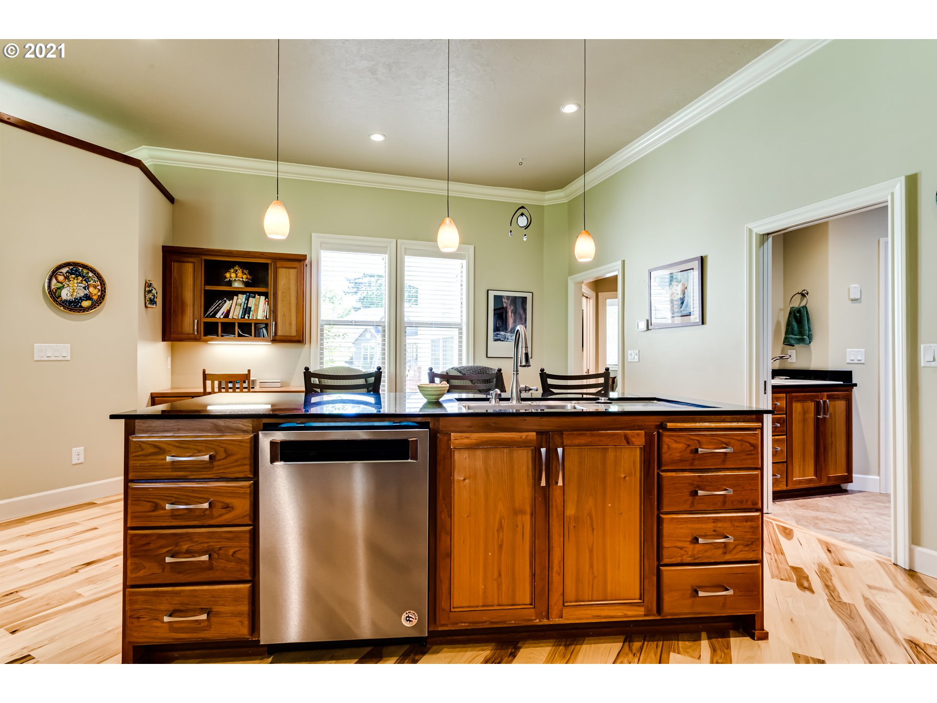 6128 Graystone Loop Springfield, OR 97478 - Photo 8 of 32 a kitchen with a sink and cabinets