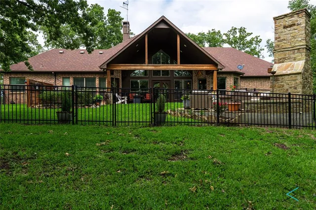 a front view of a house with yard