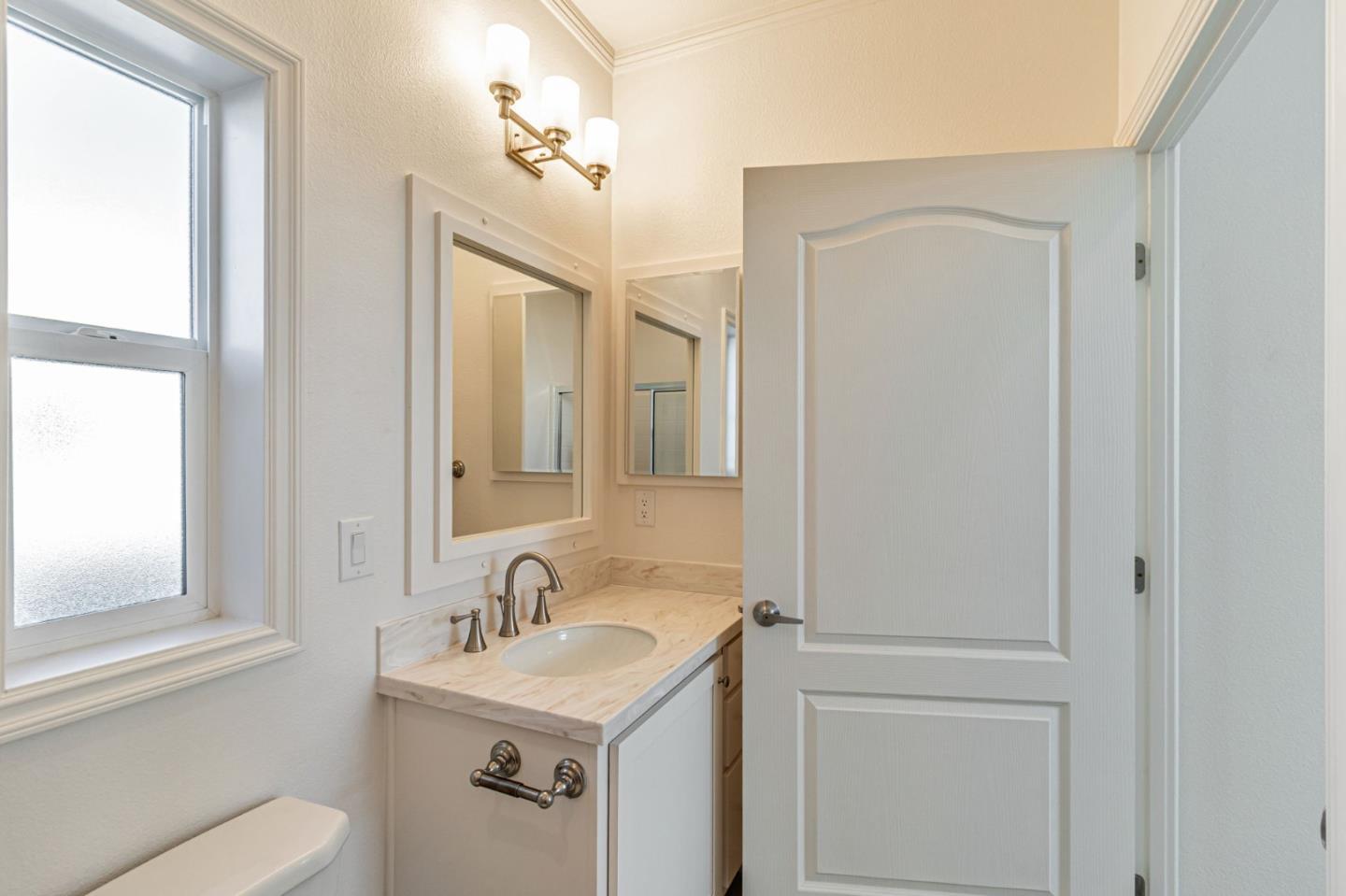 2150 Almaden Road, Unit 147 San Jose, CA 95125 - Photo 25 of 29 a bathroom with a sink and a mirror