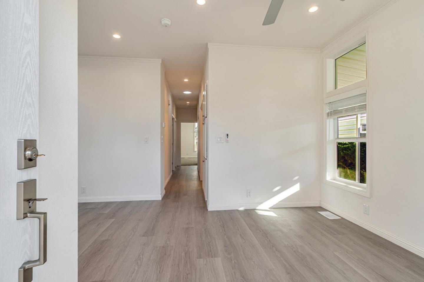 2150 Almaden Road, Unit 147 San Jose, CA 95125 - Photo 4 of 29 a view of a room with wooden floor and window