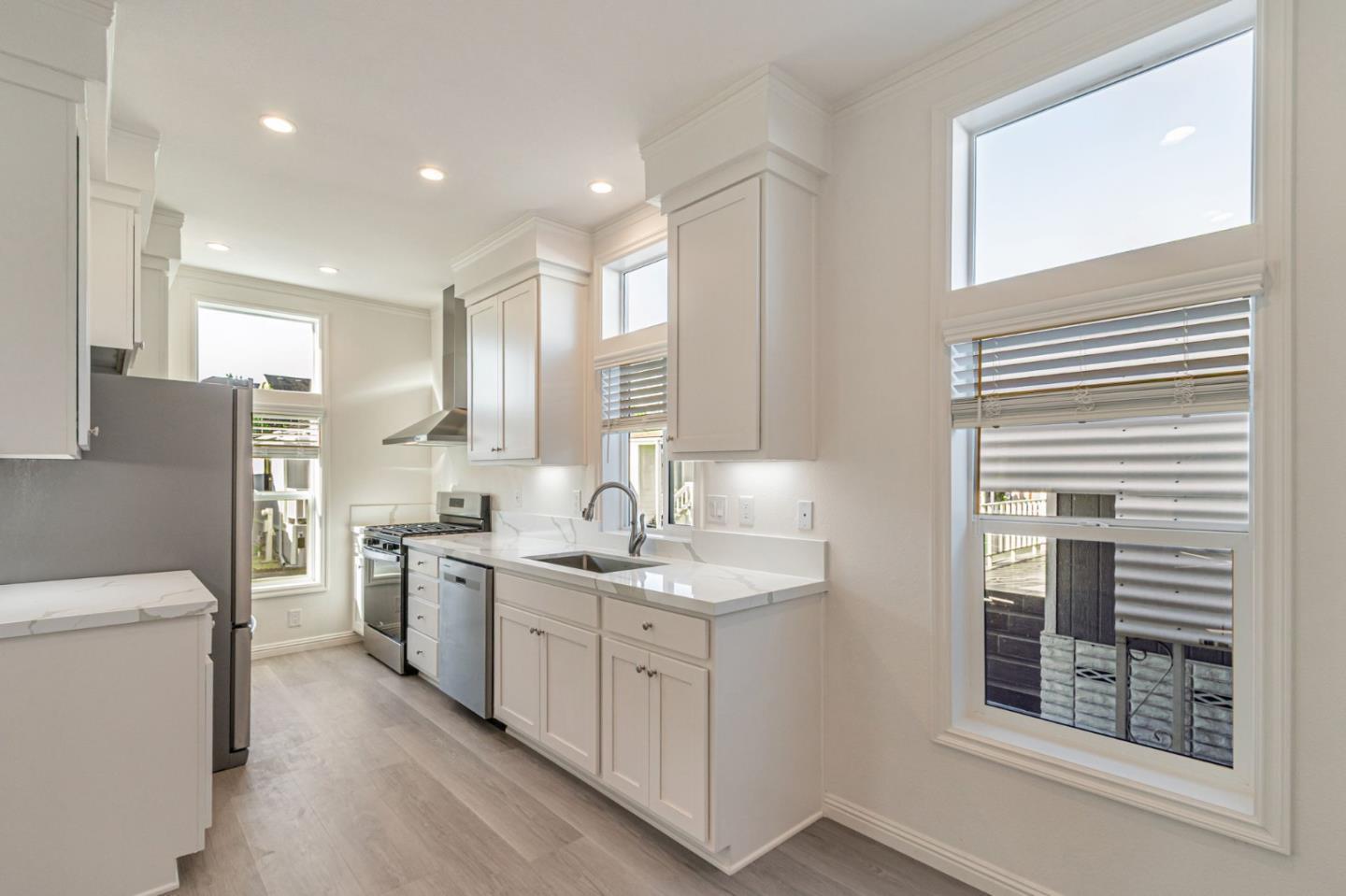 2150 Almaden Road, Unit 147 San Jose, CA 95125 - Photo 8 of 29 a kitchen with stainless steel appliances granite countertop a sink stove and refrigerator