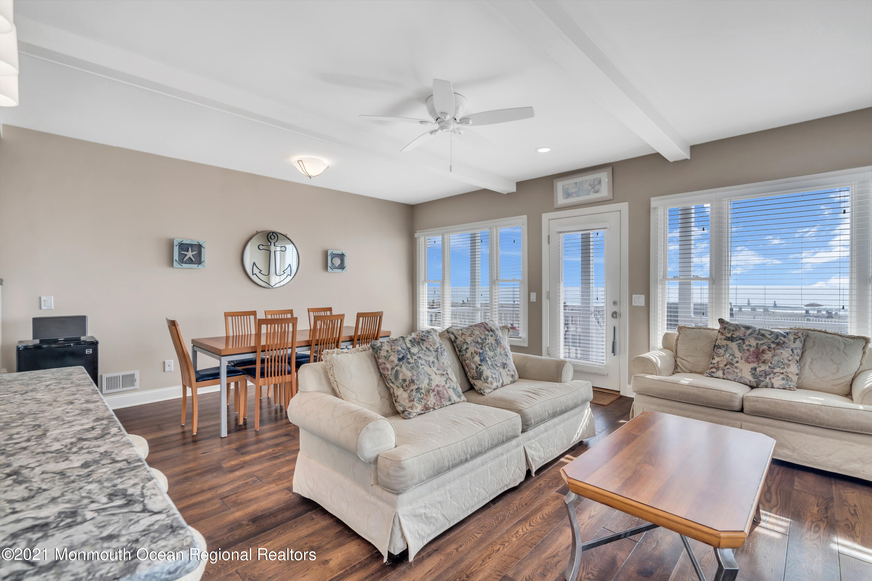 369 Beach Front Manasquan, NJ 08736 - Photo 15 of 49 a living room with furniture and a large window
