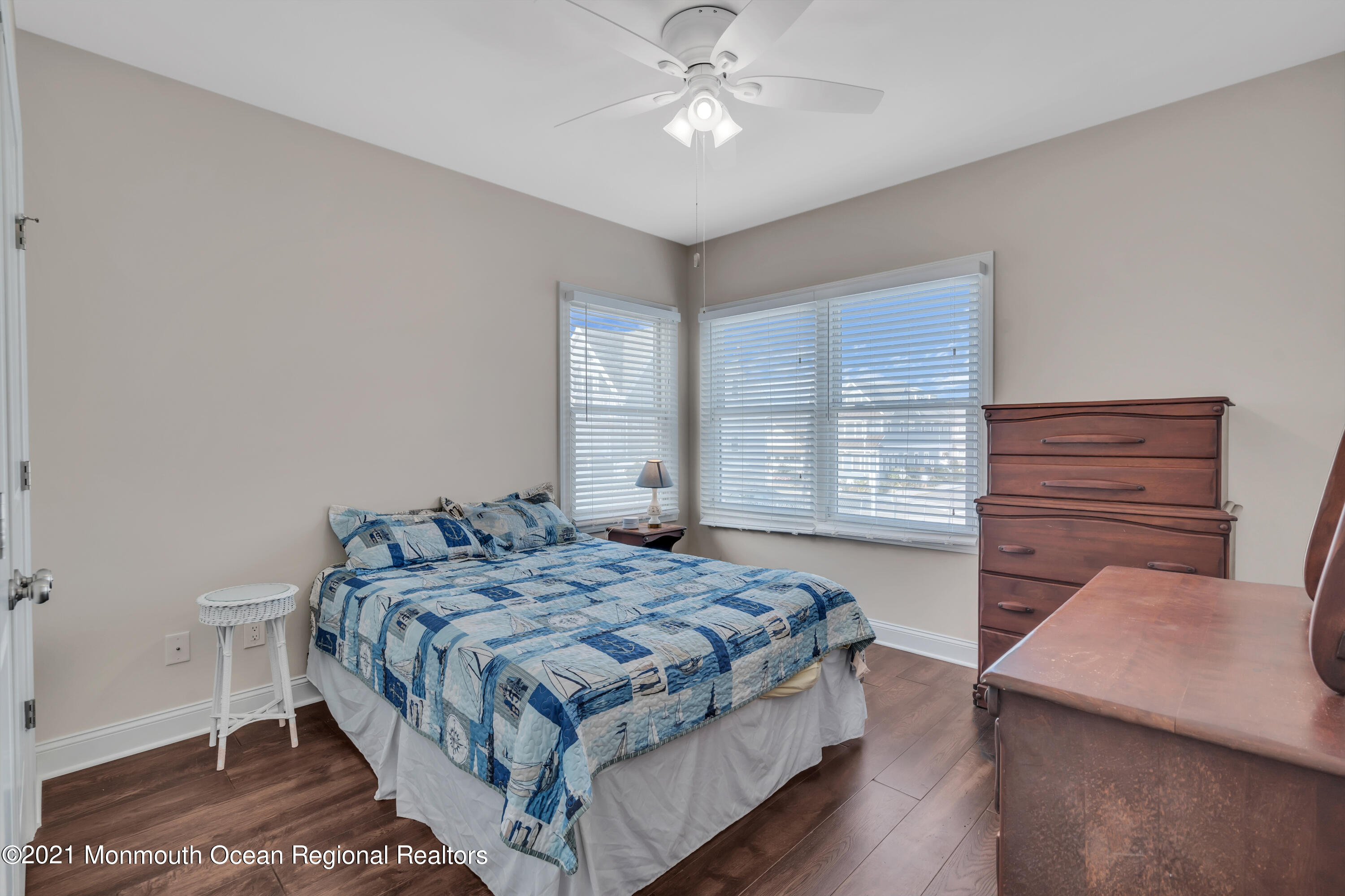 369 Beach Front Manasquan, NJ 08736 - Photo 19 of 49 a bedroom with a bed and window