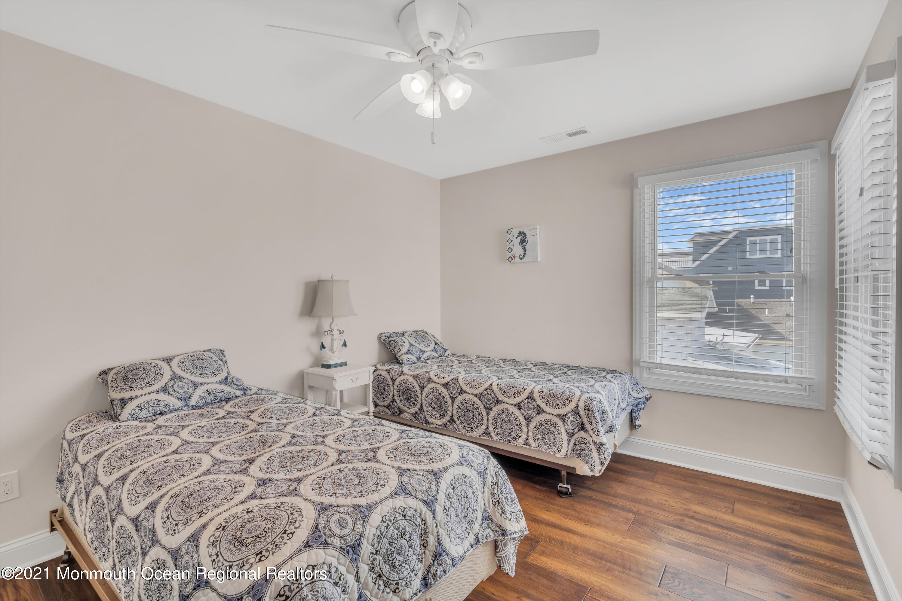 369 Beach Front Manasquan, NJ 08736 - Photo 29 of 49 a bedroom with two beds and a window