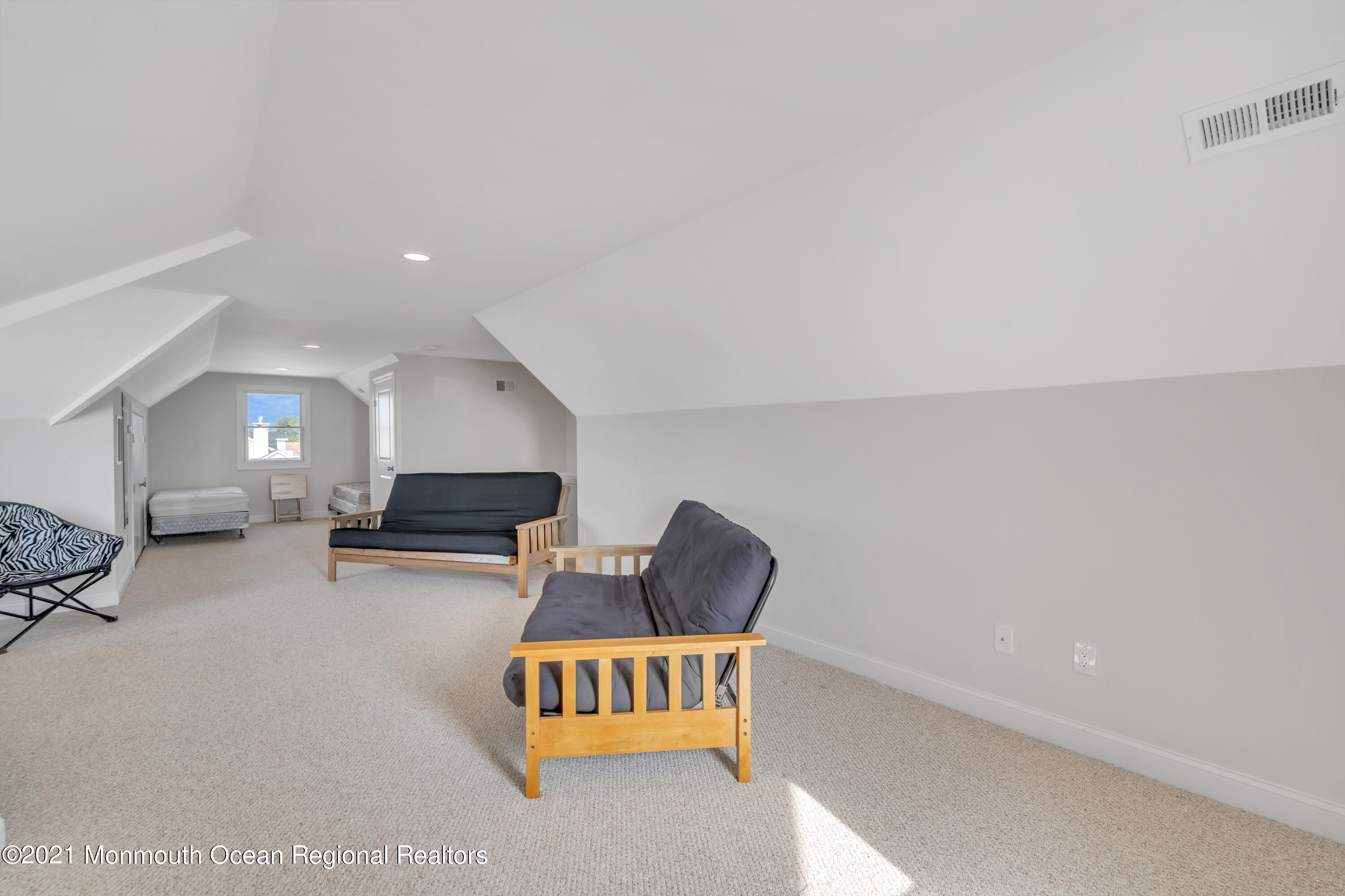 369 Beach Front Manasquan, NJ 08736 - Photo 31 of 49 a living room with furniture and a couch