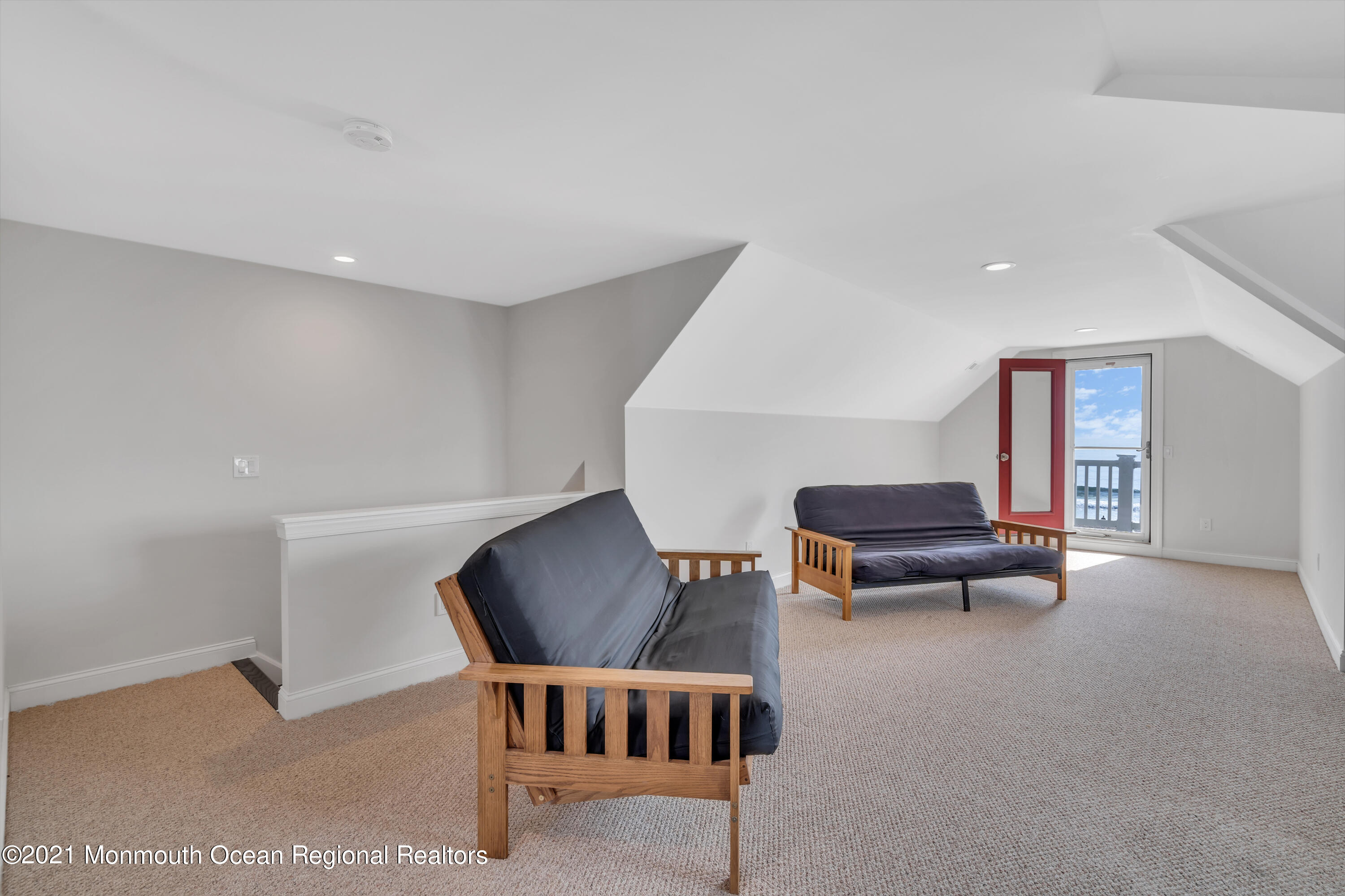 369 Beach Front Manasquan, NJ 08736 - Photo 34 of 49 a living room with furniture and a wooden floor