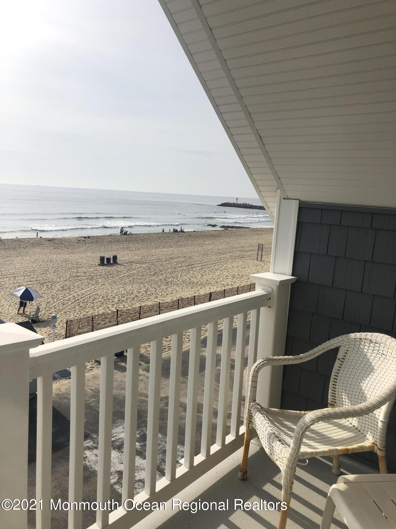 369 Beach Front Manasquan, NJ 08736 - Photo 36 of 49 a view of roof deck with wooden floor and fence