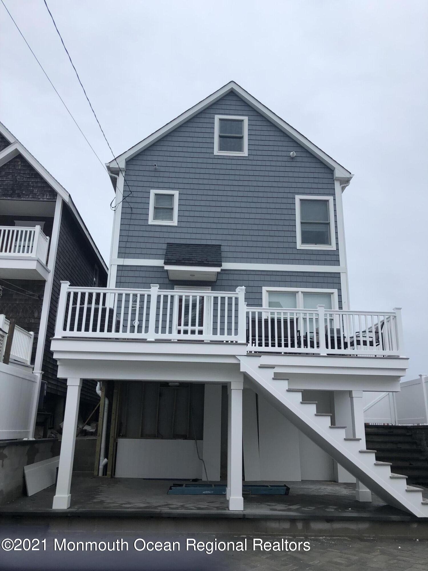 369 Beach Front Manasquan, NJ 08736 - Photo 39 of 49 a view of a house with roof deck