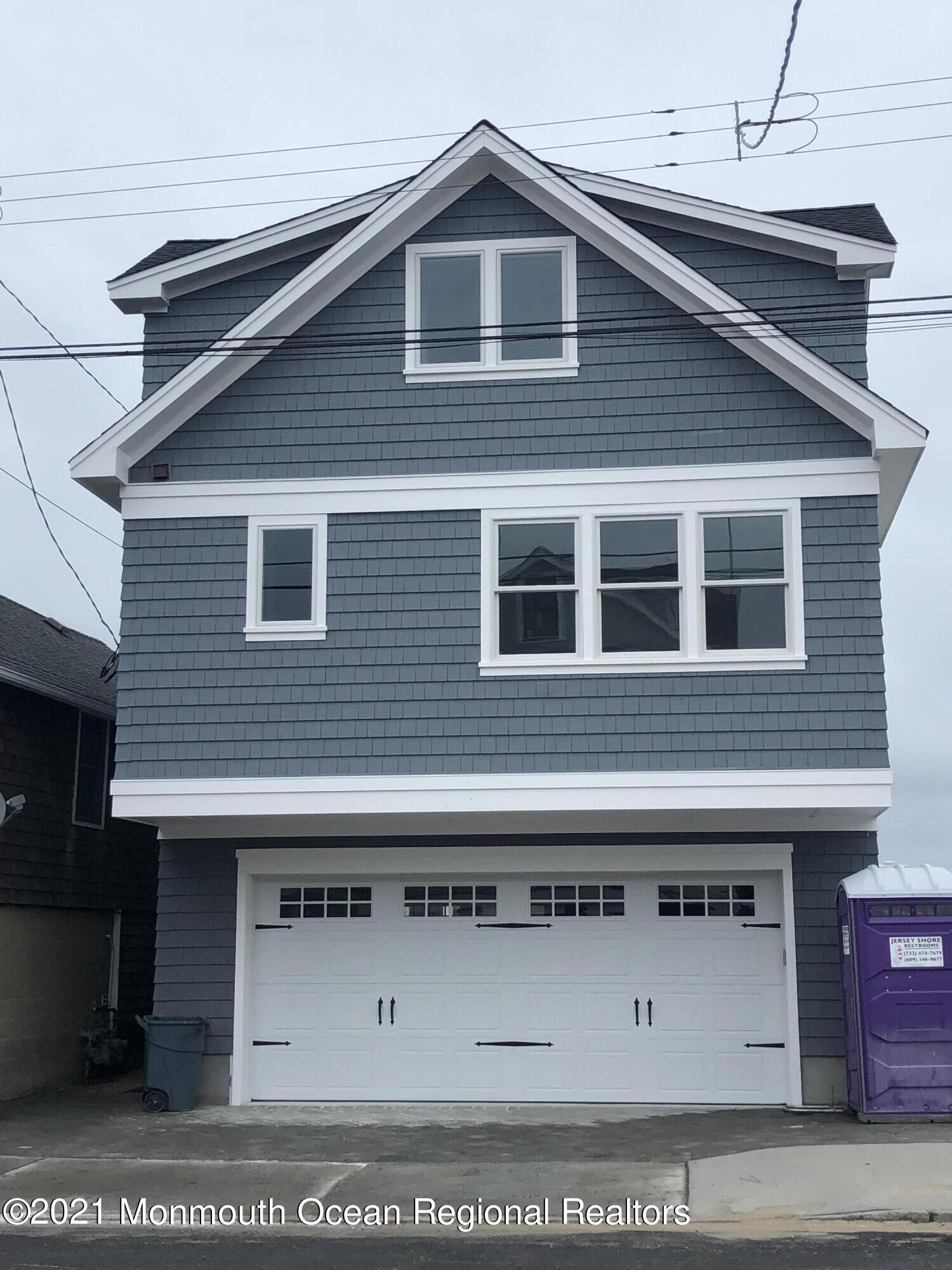 369 Beach Front Manasquan, NJ 08736 - Photo 41 of 49 a black and white photo of a house