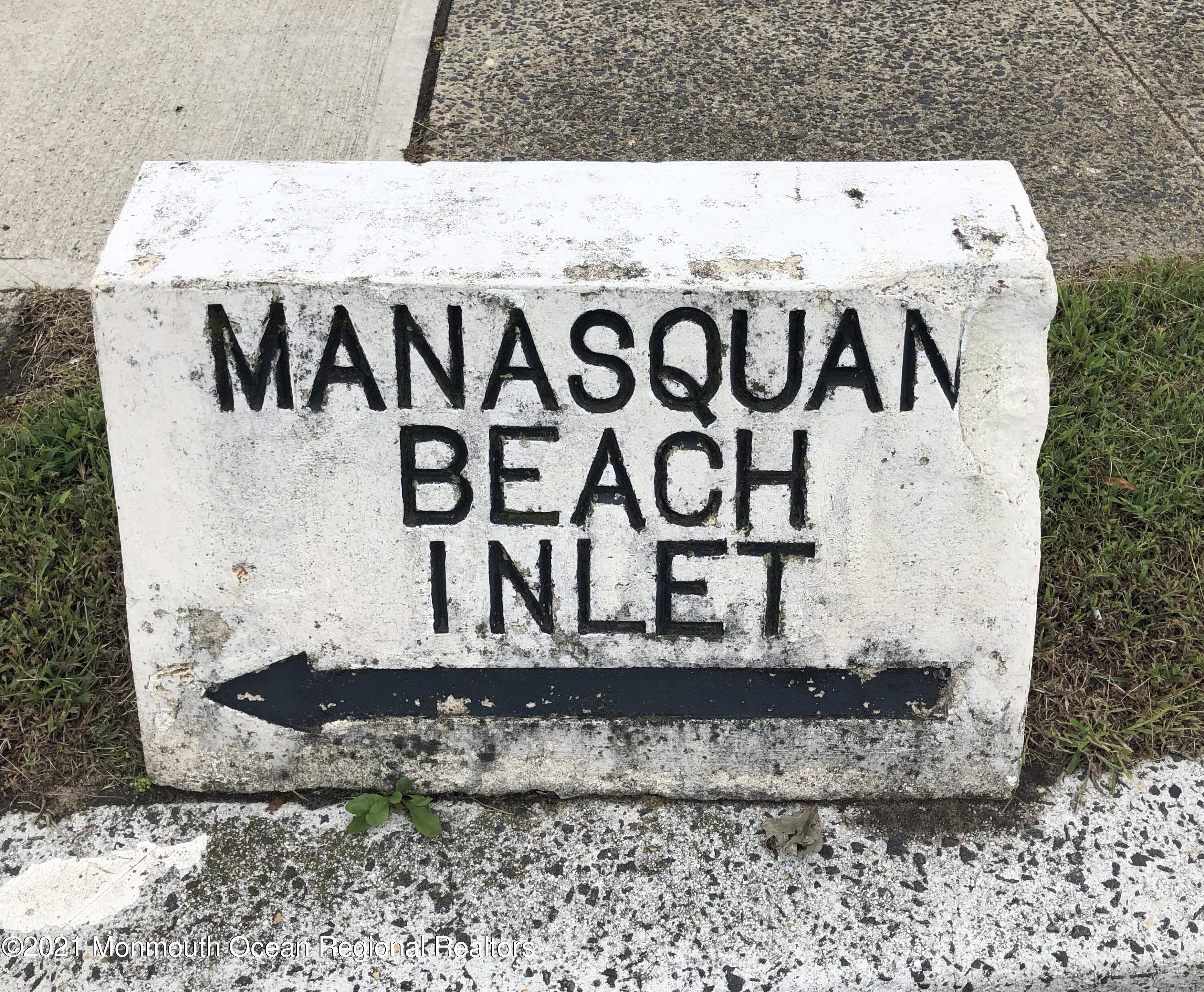 369 Beach Front Manasquan, NJ 08736 - Photo 45 of 49 a view of outdoor space with signage and flags