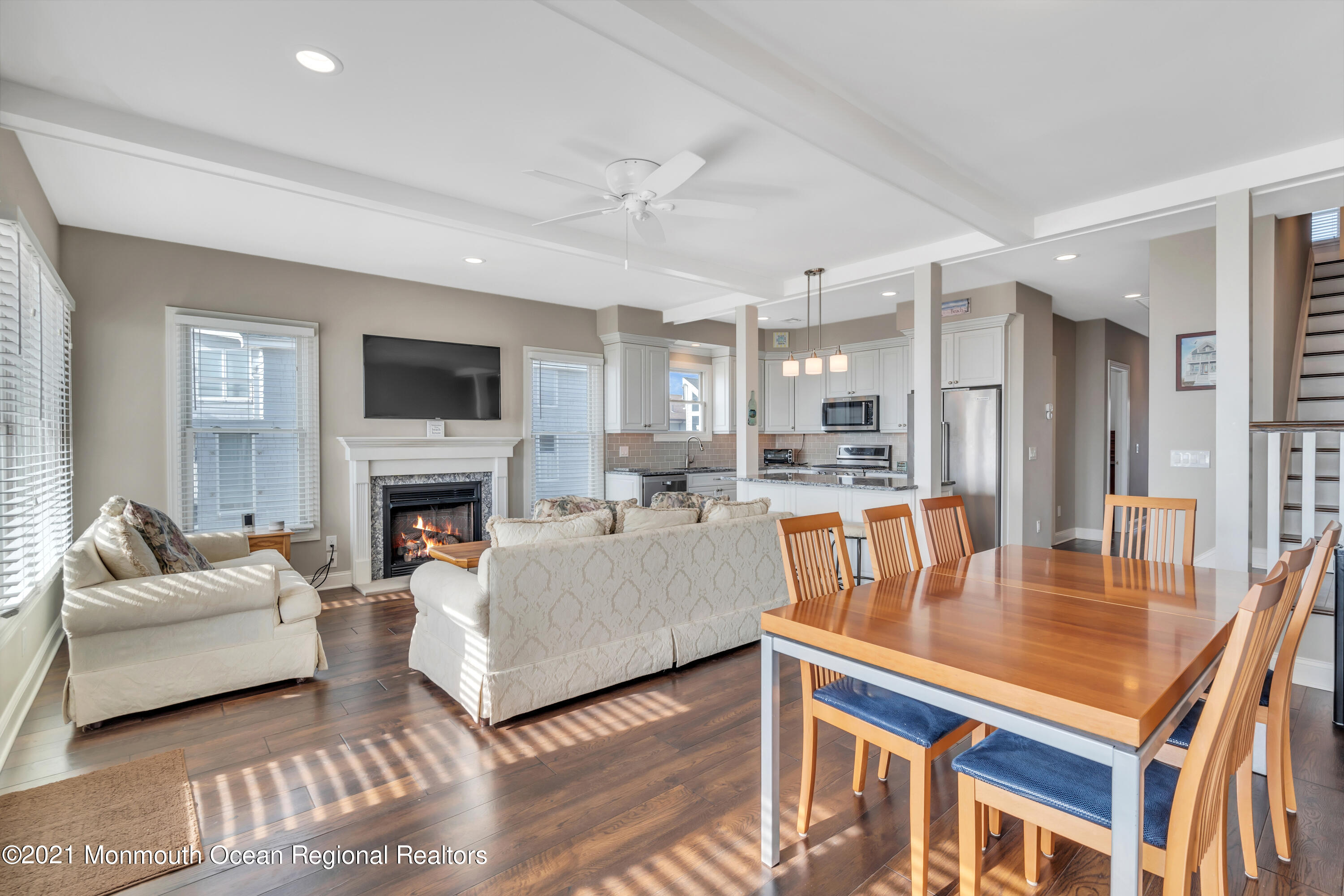 369 Beach Front Manasquan, NJ 08736 - Photo 6 of 49 a living room with furniture and a fireplace