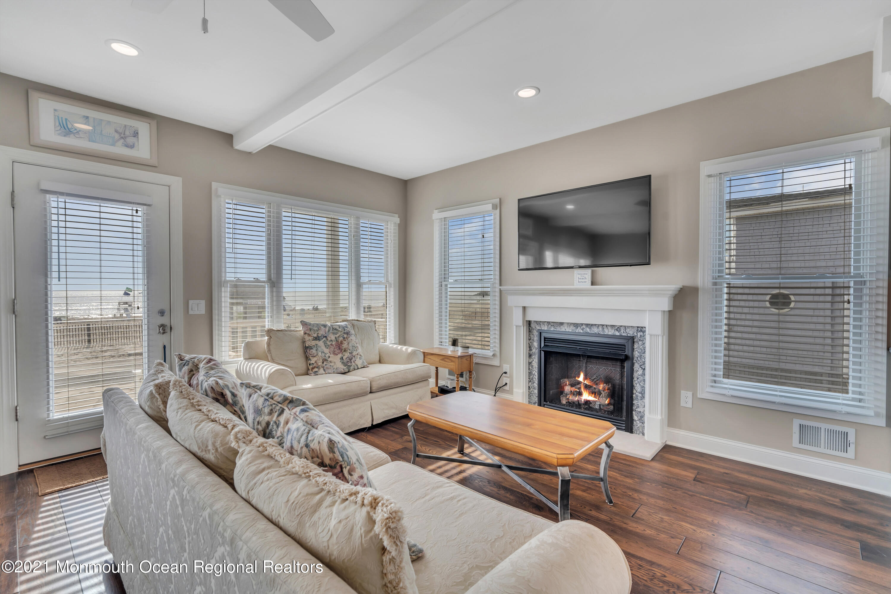 369 Beach Front Manasquan, NJ 08736 - Photo 8 of 49 a living room with furniture fireplace and flat screen tv