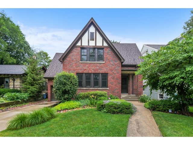 719 Arlington Road Riverside, IL 60546 - Photo 1 of 22 a front view of a house with a yard