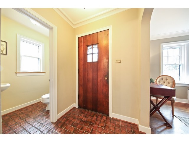 719 Arlington Road Riverside, IL 60546 - Photo 2 of 22 a view of a livingroom with furniture and wooden floor