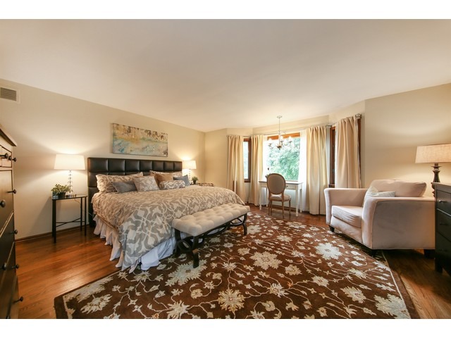 719 Arlington Road Riverside, IL 60546 - Photo 12 of 22 a bedroom with a bed and a couch