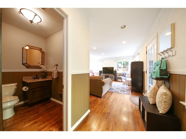 719 Arlington Road Riverside, IL 60546 - Photo 19 of 22 a living room with furniture and a flat screen tv