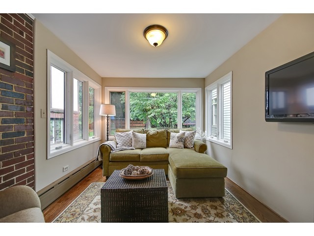 719 Arlington Road Riverside, IL 60546 - Photo 20 of 22 a living room with furniture and a flat screen tv