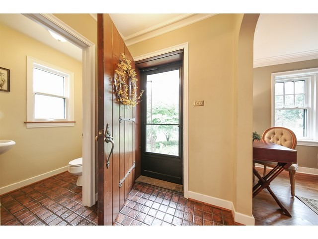 719 Arlington Road Riverside, IL 60546 - Photo 3 of 22 a view of a entryway door and living room