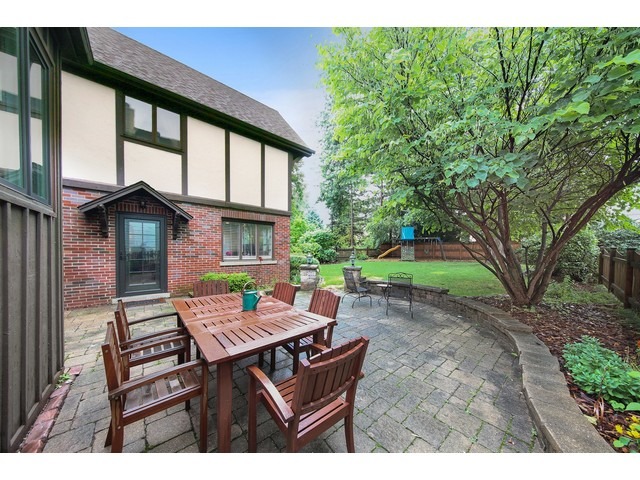719 Arlington Road Riverside, IL 60546 - Photo 21 of 22 a backyard of a house with seating space