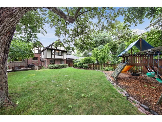 719 Arlington Road Riverside, IL 60546 - Photo 22 of 22 a view of a house with backyard and sitting area