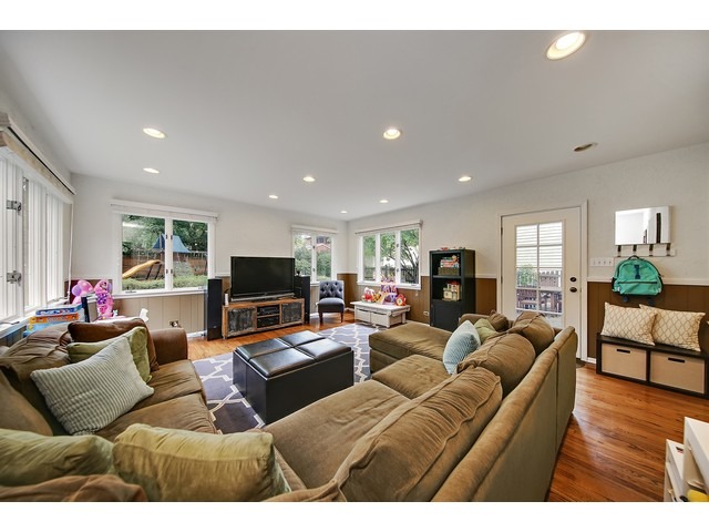 719 Arlington Road Riverside, IL 60546 - Photo 10 of 22 a living room with furniture and a flat screen tv