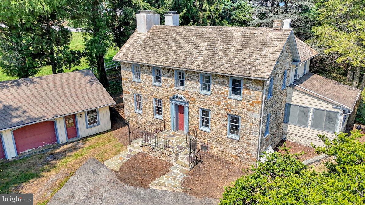 284 Old Mill Road Parkesburg, PA 19365 - Photo 1 of 50 a aerial view of a house with a porch