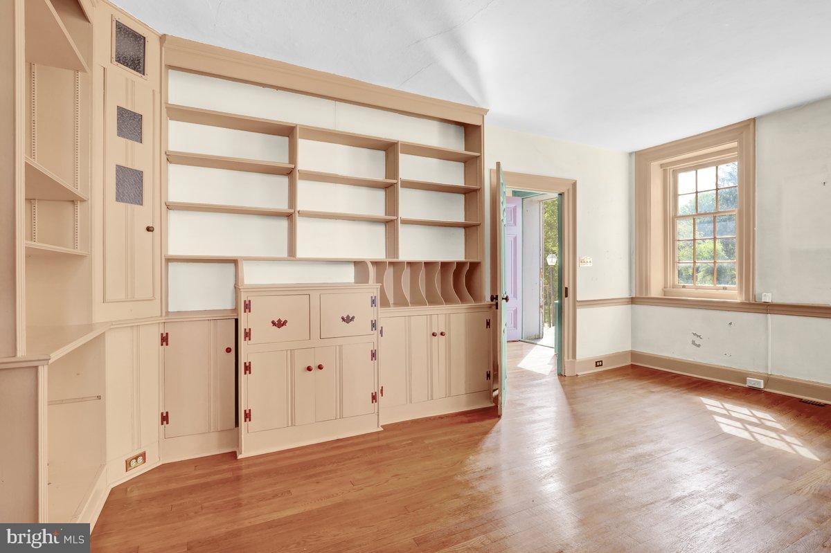 284 Old Mill Road Parkesburg, PA 19365 - Photo 11 of 50 wooden floor in an empty room with a window