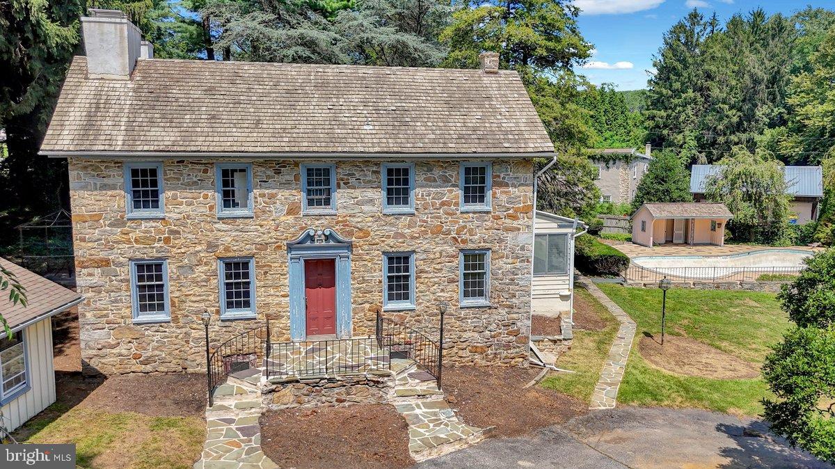 284 Old Mill Road Parkesburg, PA 19365 - Photo 2 of 50 a front view of a house with garden
