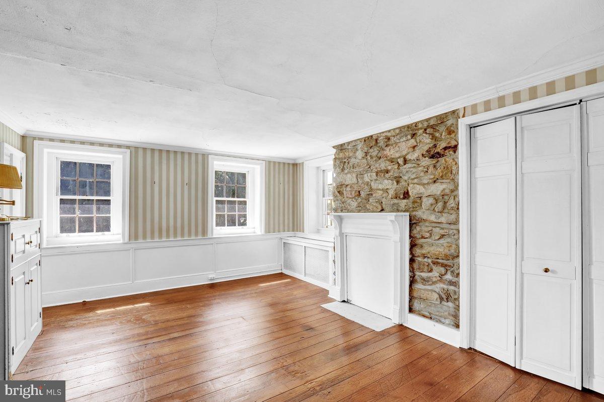284 Old Mill Road Parkesburg, PA 19365 - Photo 24 of 50 wooden floor in an empty room with a window